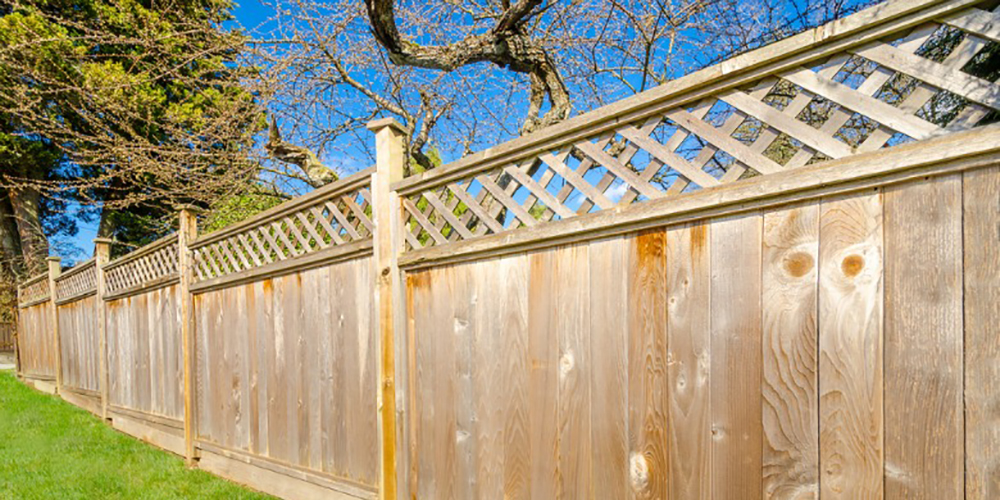 Why should I use wood preserver on my garden fence?
